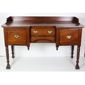 A small William IV period inverted breakfront Sideboard, with rail back and with two large and two s... 