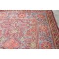 An old red ground Carpet, with wide multiple borders, deep blue ground ditto, approx. 422cms x 341cm... 