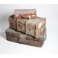 A collection of wooden leather and tin Trunks, cases, boxes, etc., some inscribed 'Alexander'. As a ... 