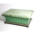A large rectangular mahogany framed upholstered Ottoman, with lift top and turned bun feet. (1)