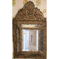 A Victorian embossed brass cushion frame Wall Mirror, and a small attractive giltwood arch top Wall ... 