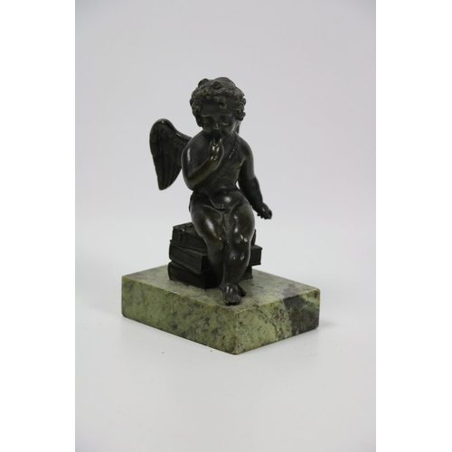 366 - A small 19th Century bronze Figure, of a cherub seated on a stack of books on rectangular green marb... 