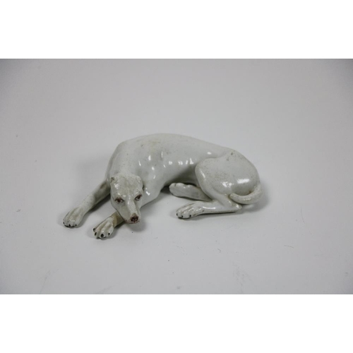 372 - A 19th Century French porcelain Figure of a reclining hound with painted eyes and nose, 5