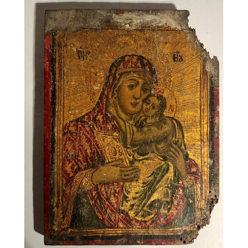 374 - A late 18th Century / early 19th Century Russian Icon, of the Madonna and Child, painted on wooden p... 