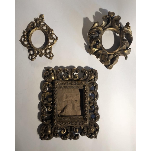 386 - A group of three ornate giltwood Bolognese type miniature Frames, with ornate design. (3)