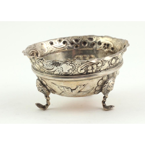 400 - A small heavy Irish Georgian silver Sugar Bowl, with embossed decoration of flowers, birds and scrol... 