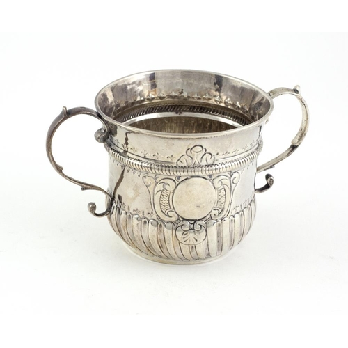 407 - A good early George II English silver two handled Porringer, of plain fluted and half reeded form, w... 