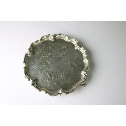 410 - An attractive engraved and embossed silver Salver, with etched design, the decorated rim with winged... 