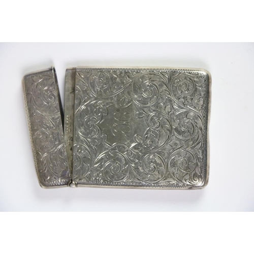 412 - A silver Card Case, Birmingham 1902 chased with scrolling foliage, 2 3/4