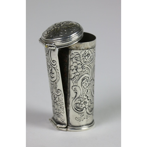 414 - A late 18th Century cylindrical silver Nut Meg Grater, crested and chased with scrolling foliage, 2 ... 