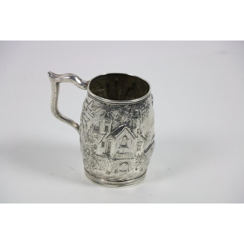 424 - A silver Mug, by S. Kirk & Son, 11 ozs, Baltimore, Maryland, with attractive repoussé decoration... 