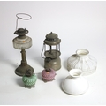 A large collection of late 19th Century oil and gas Lights, modern lamps, glass shades, etc. A lot. ... 