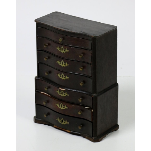 670 - A delightful early 19th Century small mahogany Apprentice Piece, modelled as a bowed seven drawer Ch... 