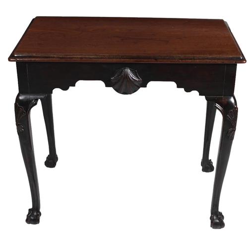 682 - An 18th Century Irish mahogany Side Table, the plain moulded top over a shaped frieze with central c... 