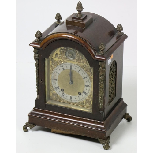 684 - A 19th Century mahogany Bracket Clock, the arched top with acorn finials over a brass dial with Roma... 