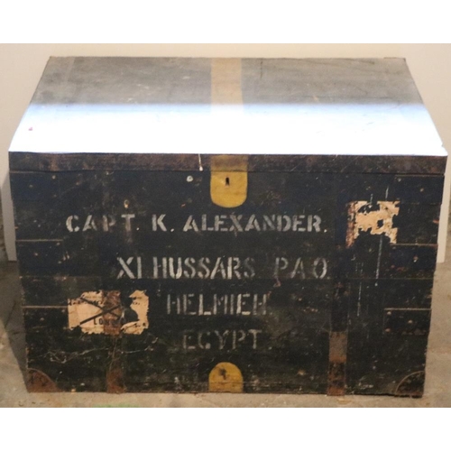 73 - An antique large tin bound wooden Military Trunk, inscribed 'Capt. K. Alexander, XI Hussars P.A.O. H... 