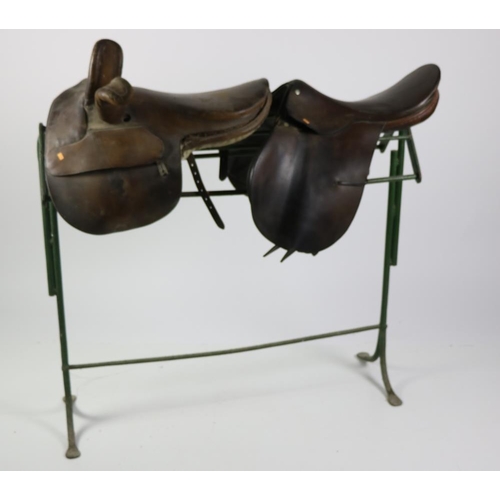 75 - A leather Ladies Side-Saddle, by Wilton, a leather Saddle by Gibson, Newmarket, and a metal Saddle H... 