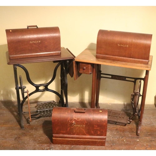 88 - Two standard Singer Sewing Machines, on metal stands, and a Singer Table Sewing Machine, as a lot. (... 