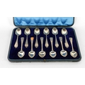 A cased set of 12 attractive large late Victorian English bright cut Teaspoons, London c. 1900, by L... 