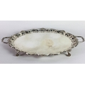 A fine heavy two handled oval English silver Tray, the decorated border with shell ornaments, on fou... 