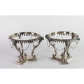 A pair of very attractive 19th Century English silver plated circular Table Stands, elaborately deco... 