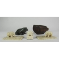 A pair of small 19th Century carved ivory elephant Paper Weights, on ivory platform bases, another s... 