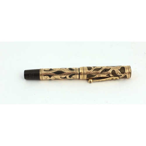 104 - A good quality and attractive Waterman 'Ideal' Fountain Pen, the gold case with engraved and pierced... 