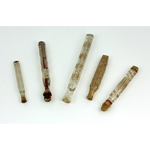 105 - A collection of five 19th Century tall narrow cutglass Scent Bottles, each with gilt decoration. (5)