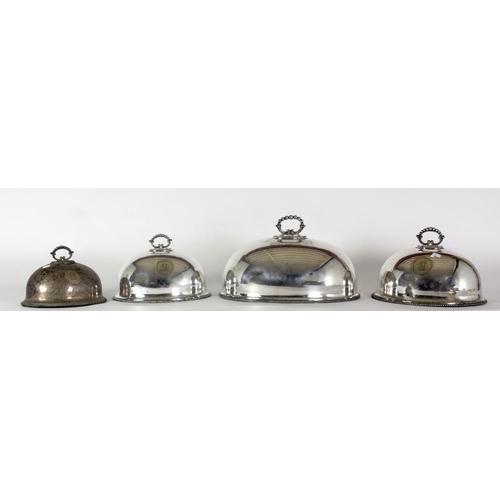 12 - A suite of four silver plated Victorian graduating Dish Covers, monogrammed DM. (4)Provenance: Paul ... 