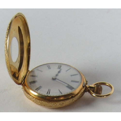 121 - A very attractive small 18ct gold keyless Pocket Watch, with enamel dial, the chased and engraved ca... 