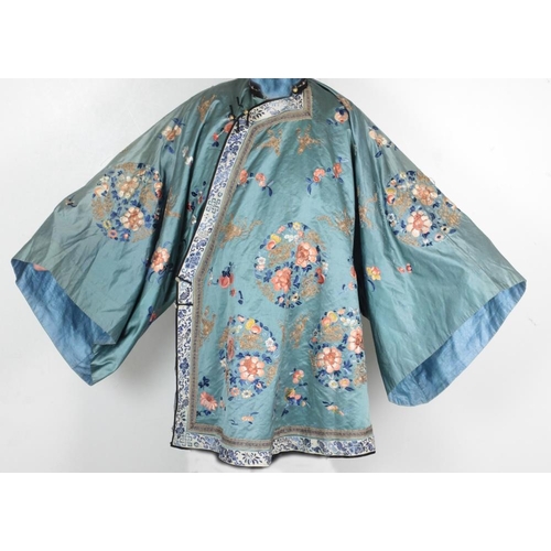 138 - A 19th Century embroidered silk Chinese blue ground Kimono, embellished with colourful floral decora... 