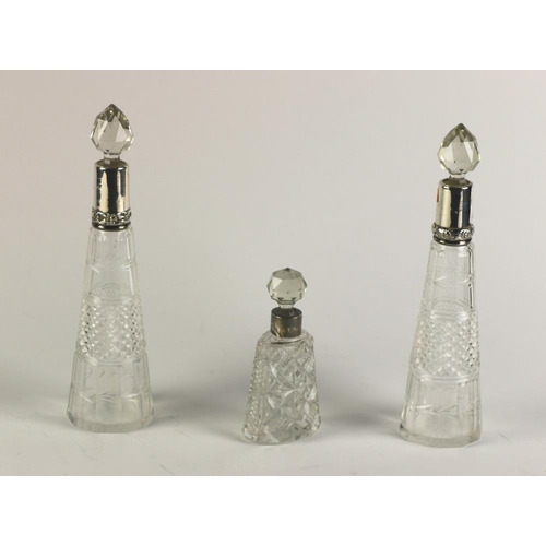 22 - A small pair of silver mounted cone shaped cutglass Decanters & Stoppers; also another small silver ... 