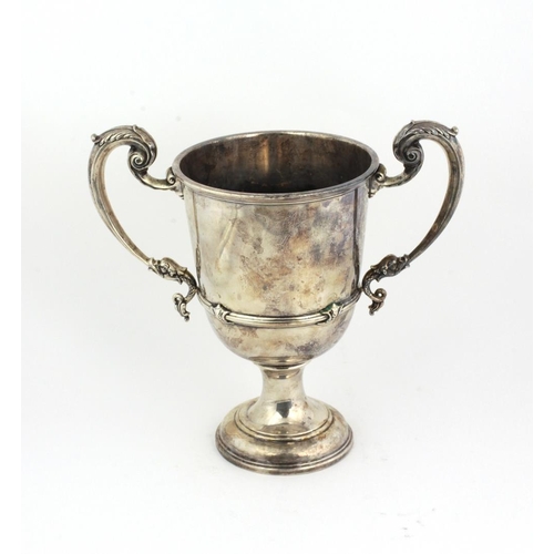 27 - A large plain silver Trophy Cup, with two dragon decorated handles, and plain uninscribed body, Birm... 