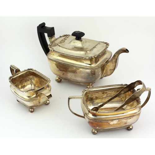 29 - A large late George III Irish silver Tea Service, teapot (with wooden handle) cream jug and sugar bo... 