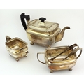 A large late George III Irish silver Tea Service, teapot (with wooden handle) cream jug and sugar bo... 