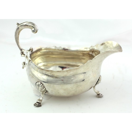 32 - A rare plain George II English silver Sauceboat, London c. 1755, maker possibly Henry Miller,  with ... 