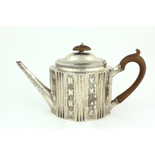 35 - An attractive English George III shaped oval bright cut silver Teapot, London c. 1809, by R.H., poss... 