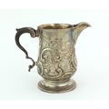 An attractive embossed late 18th Century English Cream Jug, London c. 1794, maker possibly G.G. (Geo... 
