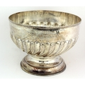 A very large silver Punch Bowl, with reeded swirl body, a tall circular foot, Birmingham c. 1906, by... 