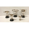 Five varied two handled silver Trophy Cups, various sizes, mostly Dublin c. 1940's, 50s', including ... 