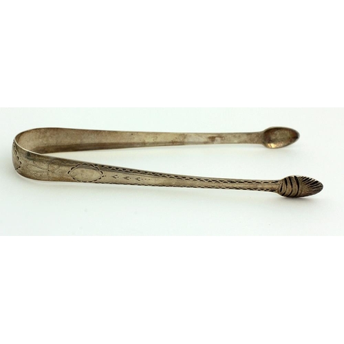 67 - Dublin Silver: A unique collection of 28 Irish Georgian silver Sugar Tongs, numerous bright cut, som... 