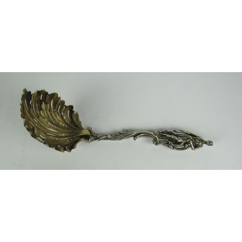 74 - A rare and elaborate Apostle type Spoon, the top with fine figure of classical woman with hound, ove... 