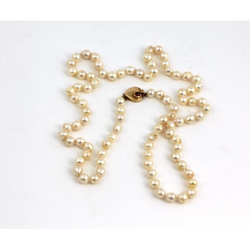 92 - A large Necklace, of 'Baroque' shaped freshwater cultured pearls, approx. 88cms (35