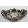 An attractive pierced and decorated oval shaped Silver Tray, with shell design, floral garlands and ... 