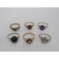 A collection of five gold and silver Rings, set with amethyst, rubies, opals, garnets etc., as a lot... 