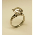 An elegant and important round brilliant cut Solitaire, 4.53ct, 10.7mm diamond Ring with fluorescenc... 