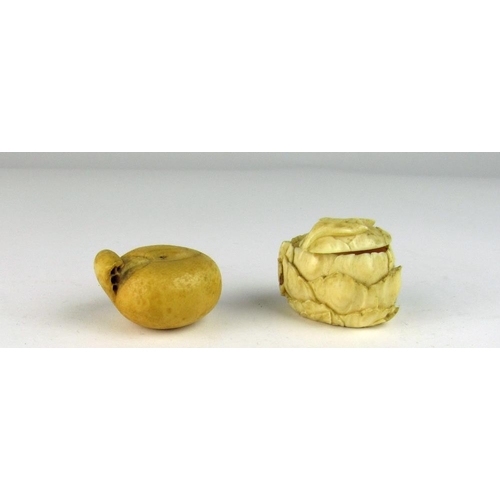 100 - A small Japanese ivory Carving of a fruit; and a leafed Vegetable with a locust, on the removable li... 