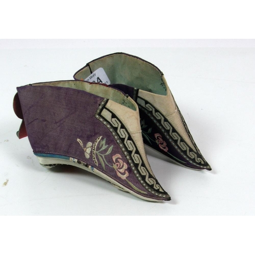 108A - A small pair of 19th Century Chinese Ladies small silk Shoes, with embroidered decoration. (2)