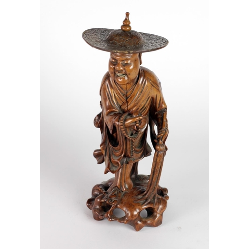 118 - A very good 19th Century Japanese carved boxwood Figure, of a Street Vendor, approx. 41cms (16