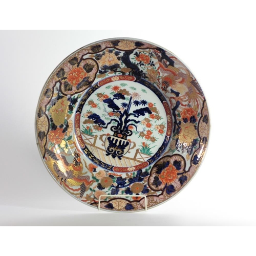 121 - An extremely fine large 19th Century Japanese Imari Charger, decorated with deep blues, red and gold... 